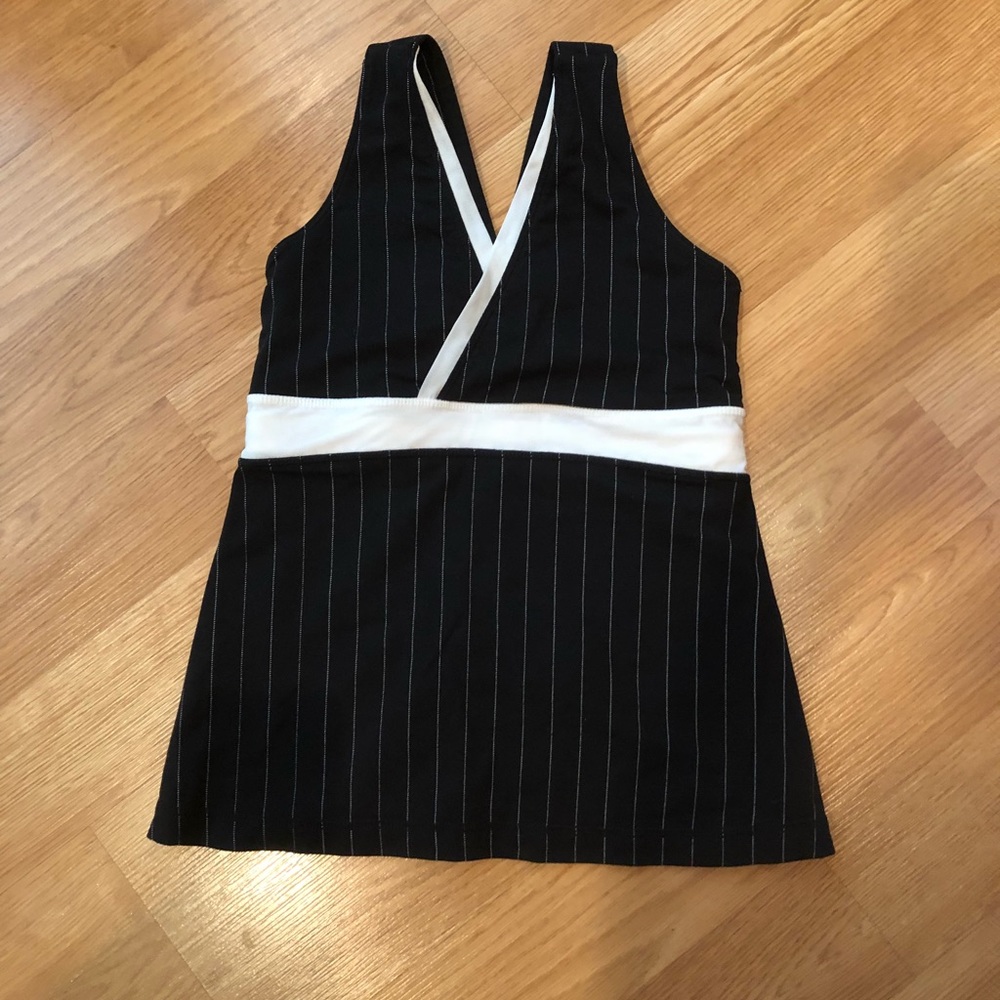 Lululemon black with white pinstripe top. Size 4